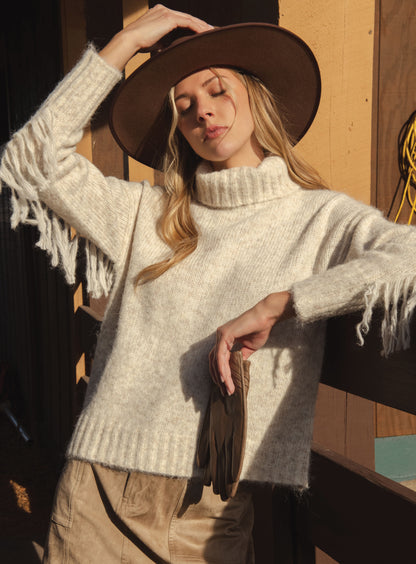 Turtle Neck Fringe Sweater